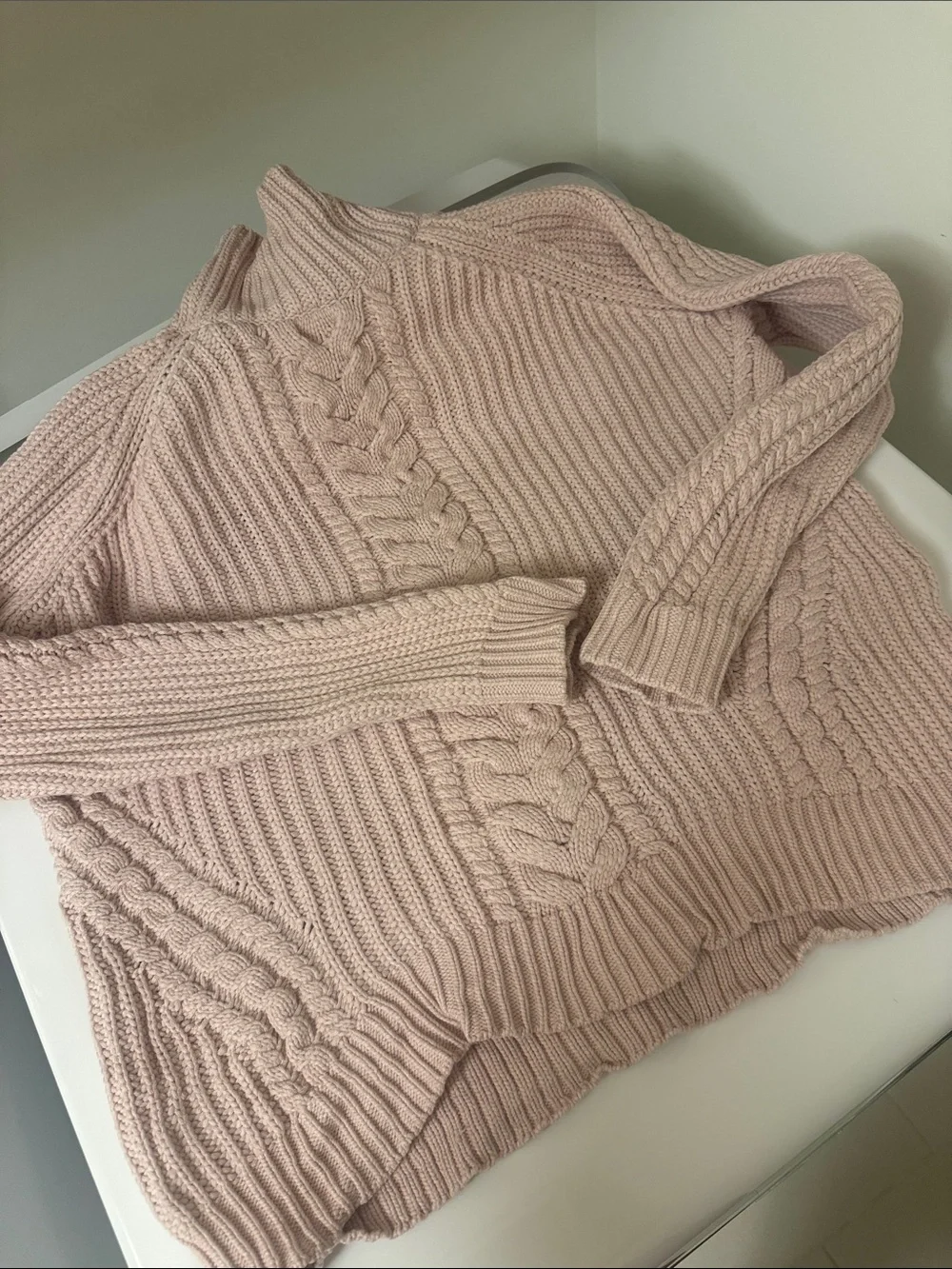 Lululemon Bring The Cozy Turtleneck in a soft misty pink cable knit